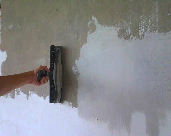 The process of putting putty on drywall