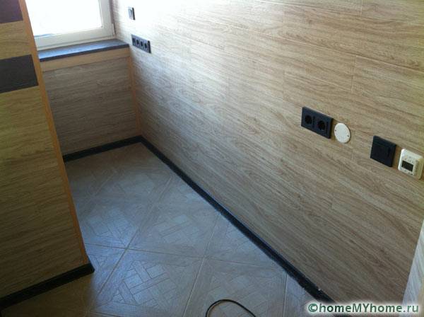 Декорация на стена на стаята с ламинат