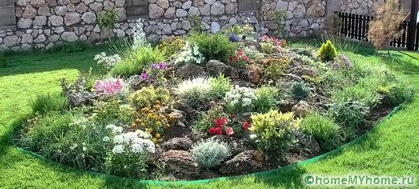 Diy alpine slide with stones in the country: photo