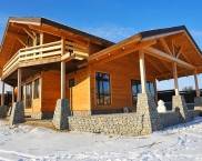 Ampliamento a una casa in legno: progetti