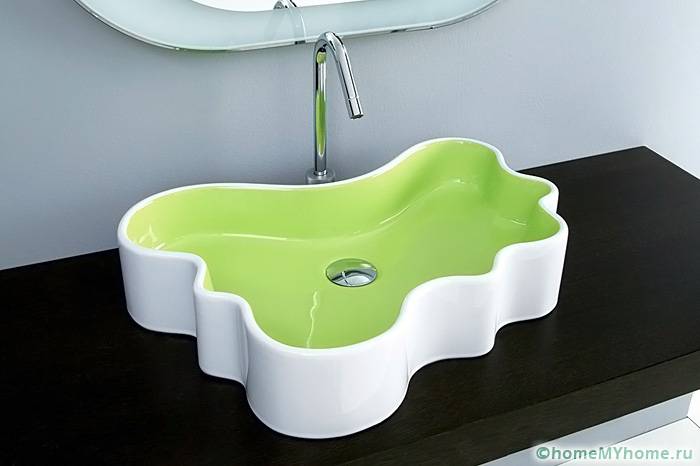 Custom-shaped washbasins create an unusual and relaxing atmosphere in the bathroom
