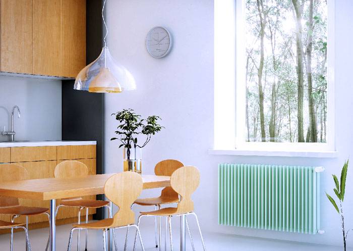 It is better to install heaters under windows, so you can minimize heat loss