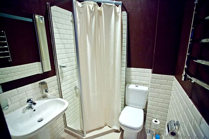 There will be no place for a wide bath, but it will be completely replaced by a modern shower cabin with a deep tray and a jacuzzi function