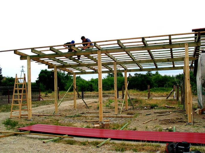 The wooden carport frame is universal. It is suitable for the subsequent installation of corrugated board, ondulin, polycarbonate, metal, or soft roofing