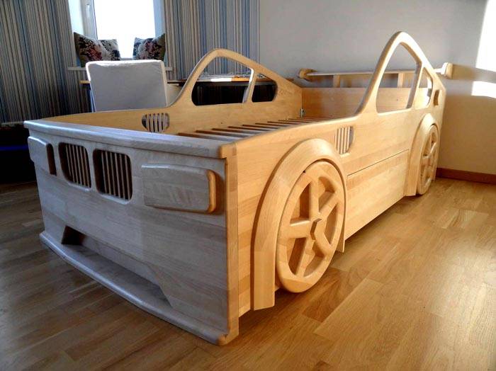 A bed in the shape of a car is a dream of any boy