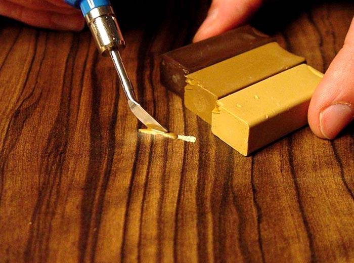 Wax will help remove deep scratches