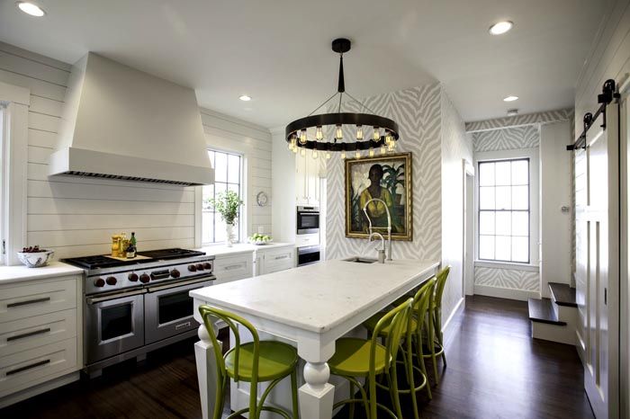 White kitchen accents are made in olive tones