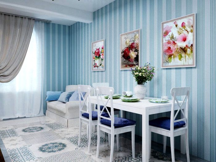 Accents in the form of paintings in shades of pink will be a great addition to the blue color.