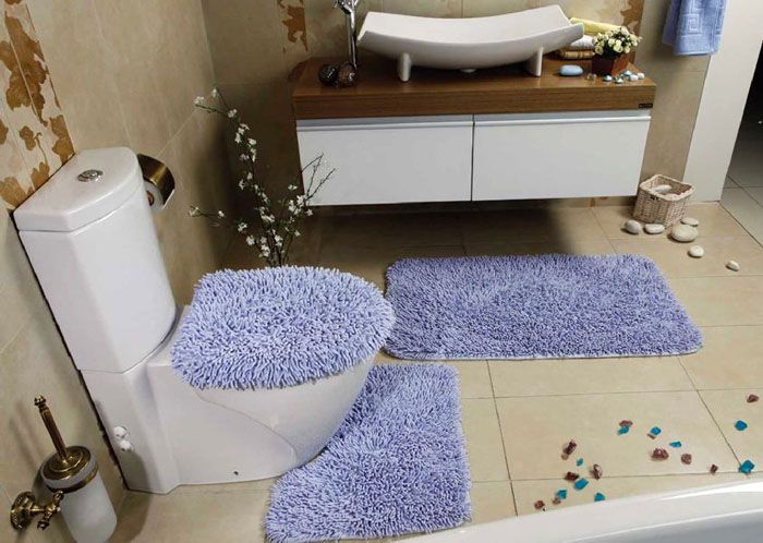 Un tapis près de l'évier est confortable, pratique et beau