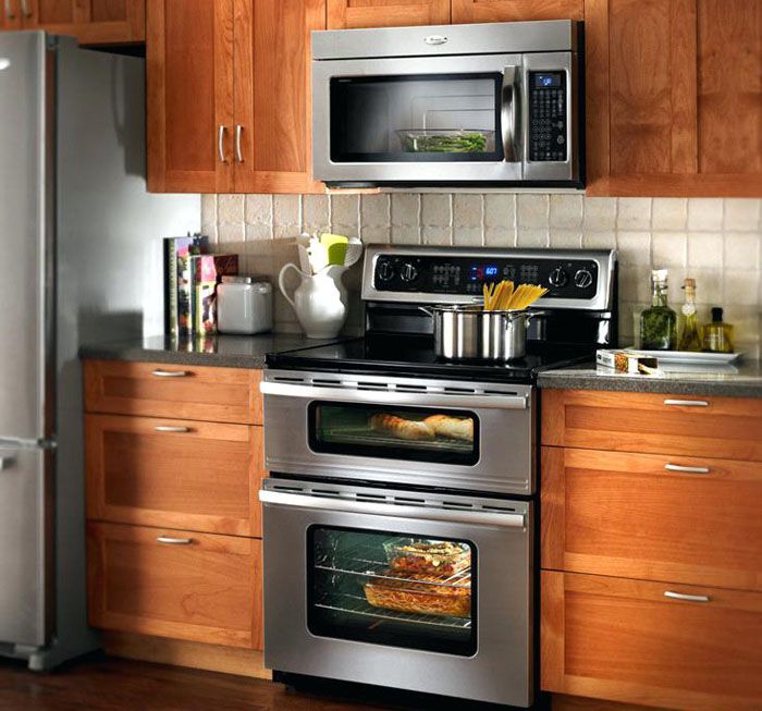 An independent oven of large dimensions is functional, but takes up a lot of space
