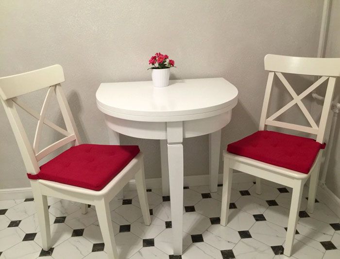 Special compact furniture. The table top in this model can be expanded. The leg is extended with this transformation to form additional support.