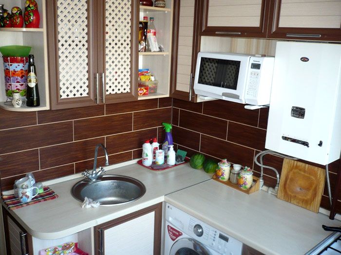 If you only intend to warm up ready-made dishes from cooking, instead of a bulky oven, you can install a light compact microwave in a suitable place