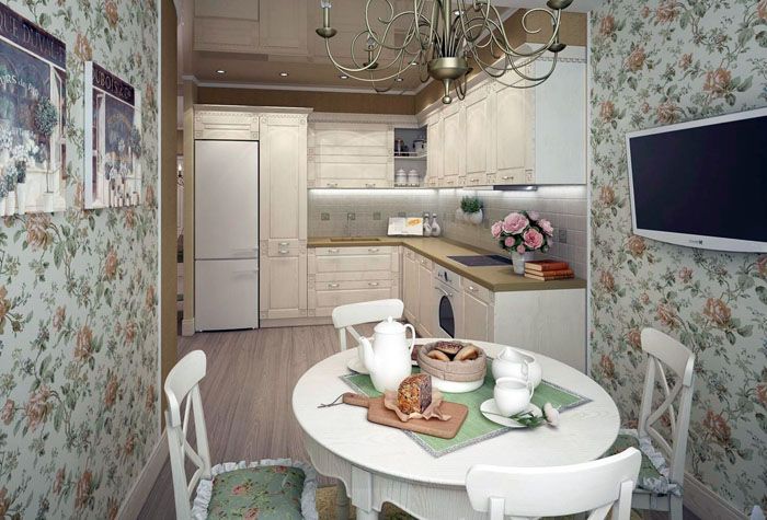 Similar upholstery and wallpaper patterns maintain a consistent style