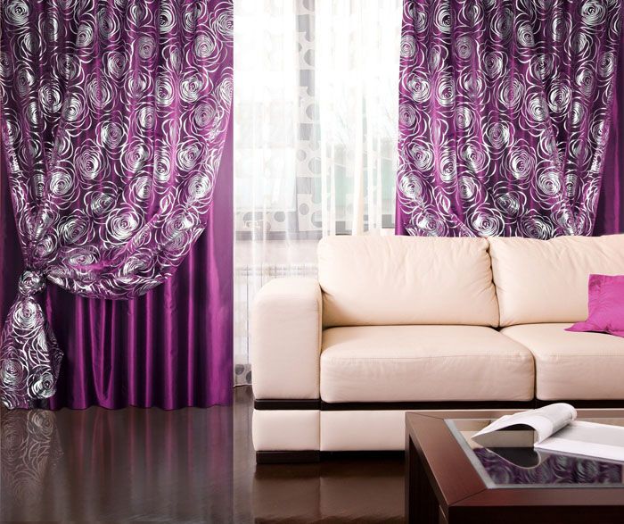 Rich purple textiles are set against a delicate shade of beige. Like this combination or not, it's a matter of taste.