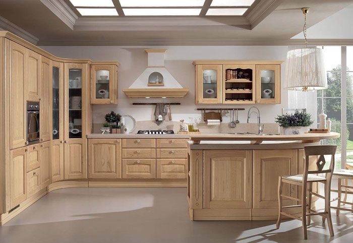 In the photo, the design of the kitchen in beige