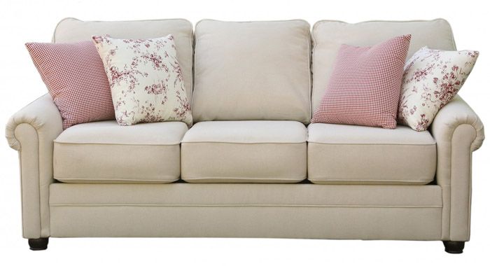 Monochromatic furniture in neutral tones is necessarily complemented by an abundance of textiles