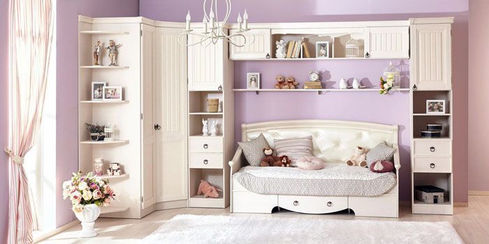 Pink, lavender, lilac - color combinations come to the fore. Girls will love the bedroom in delicate colors with an abundance of textile things painted with flowers