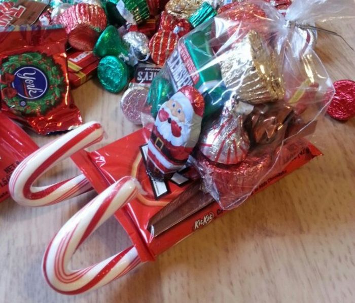 In the case of using hot glue as runners, it is problematic to use hot glue: a thin film-packaging will not withstand high temperatures. Instead of glue for fastening, it is better to use satin ribbons