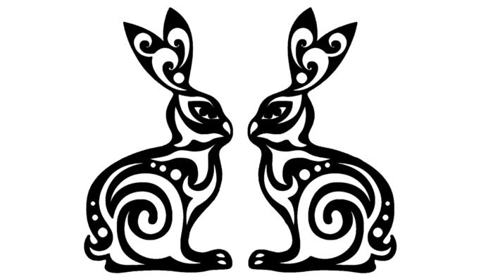 Bunnies can sit under the Christmas tree on the window, and not far from the paper village