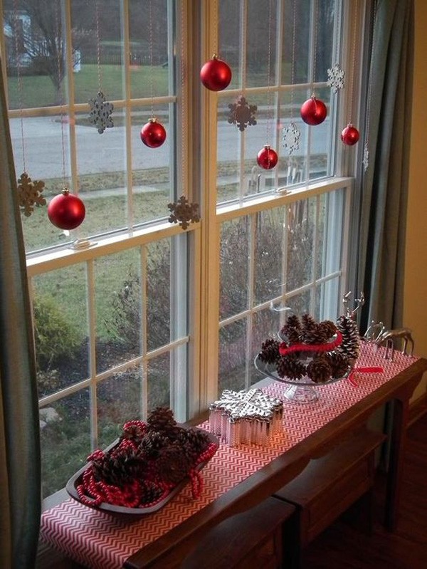 It is better to place some composition on the windowsills and hang several decorations