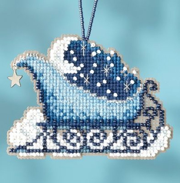 The cross-embroidered sleigh and beaded will look perfect on the tree. You can create an embroidery scheme yourself or find a ready-made version