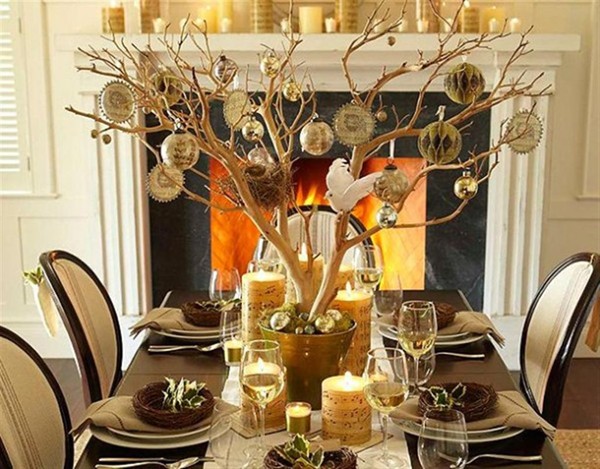 It is advisable to place tree branches decorated with balls in the center of the table