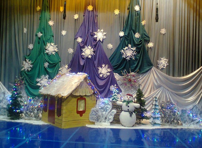 The decor should not interfere with the action on the stage, but it should not be placed in an inconspicuous place.