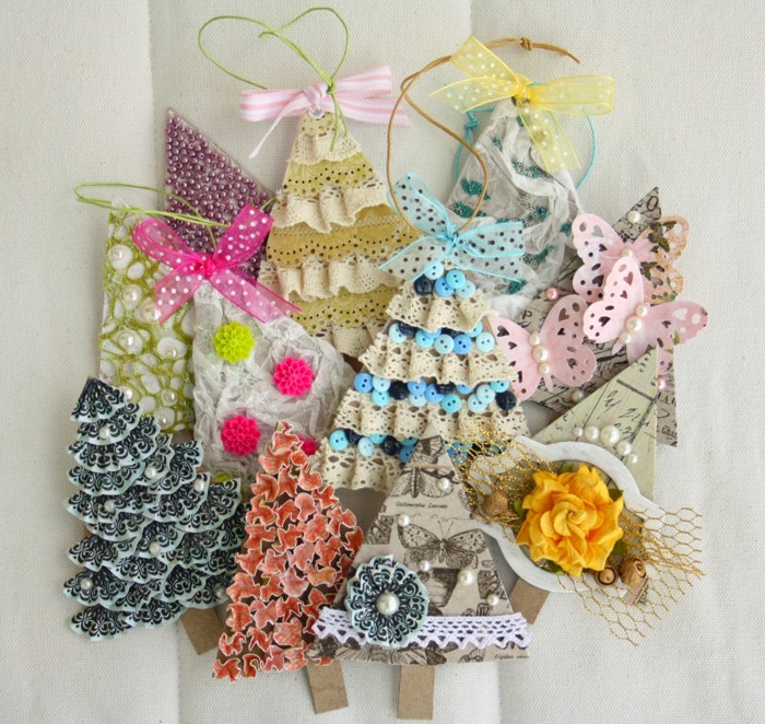 There are many ways to make a Christmas tree: this is a fan technique, and the use of a metal cutter, and a prefabricated Christmas tree made of snowflakes or elements from a special figured hole punch. We are not afraid to show our imagination!