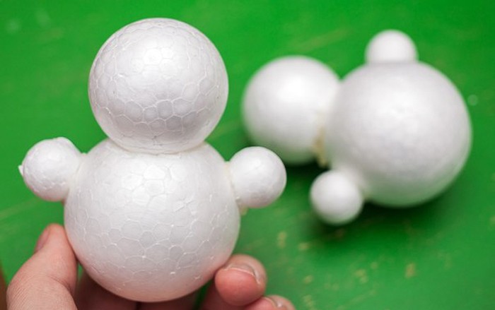 The edges of the balls are slightly cut off for easy gluing with hot glue