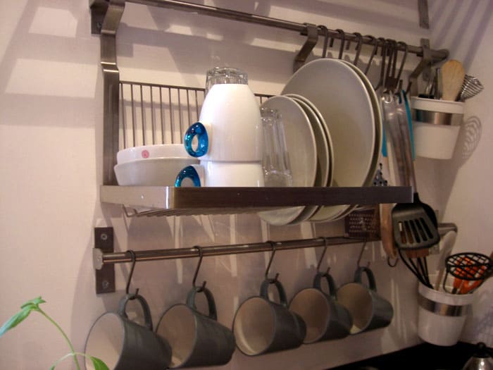 If you need maximum practicality, then it is better to make a tiered arrangement of the storage system, distributing all inventory by zones