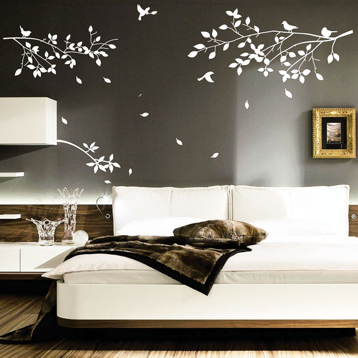 Themed wall decoration at the head of the bed